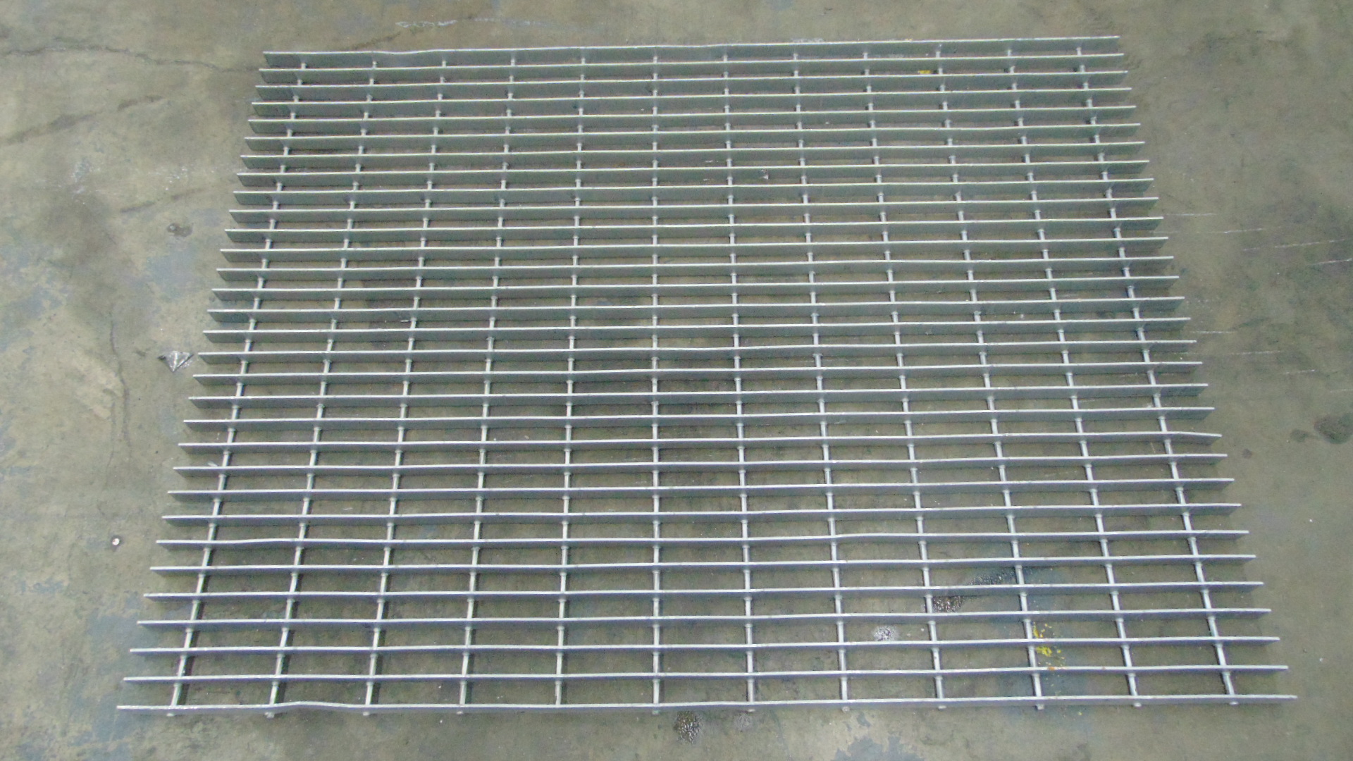 A piece of painted steel grating