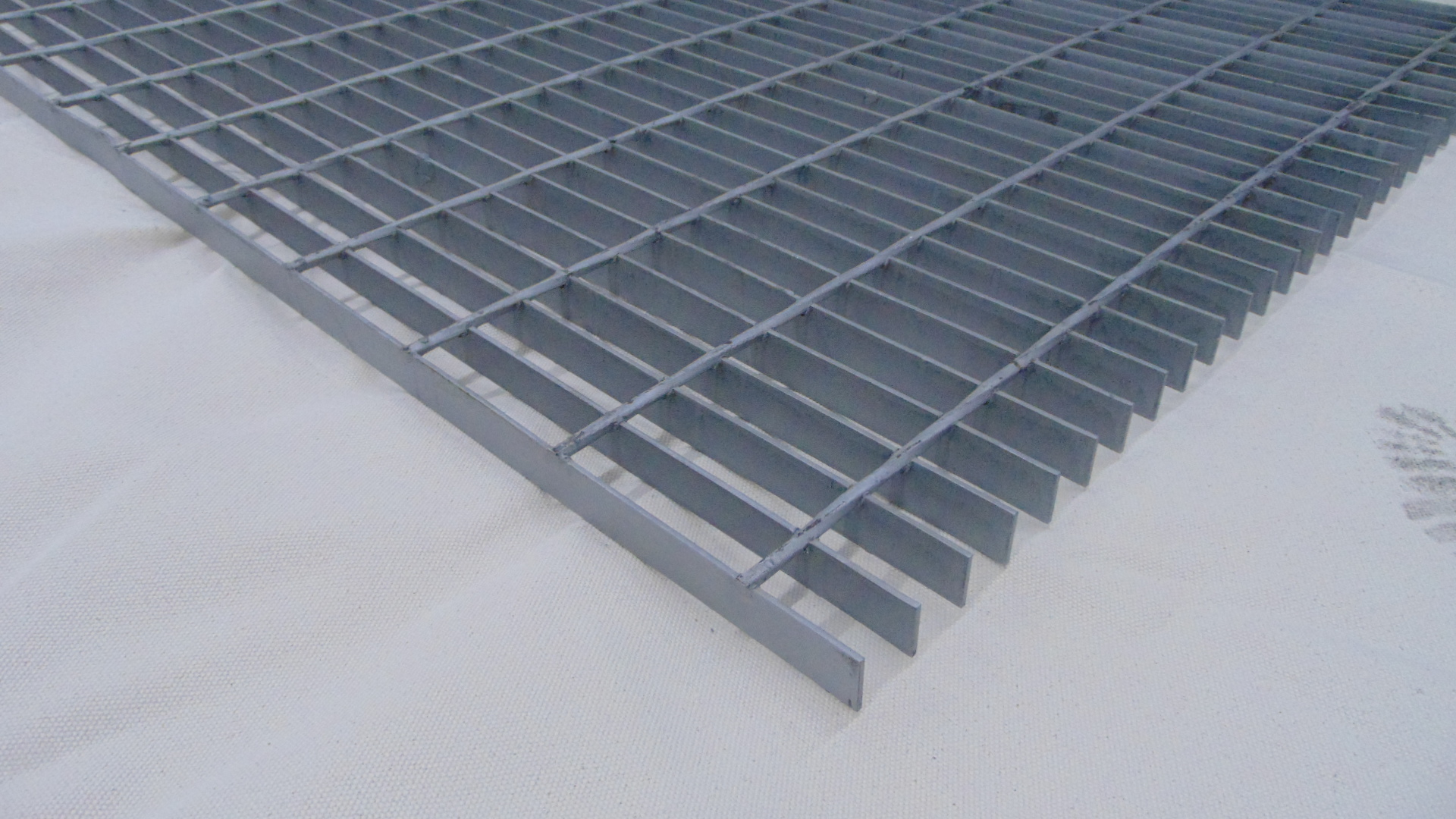 A piece of painted steel grating