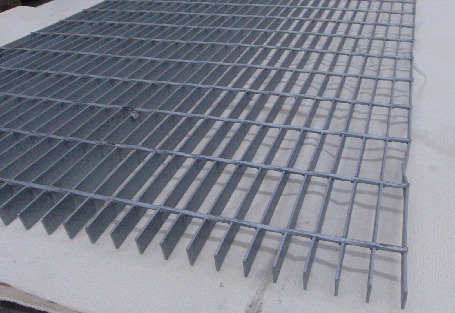 A piece of painted steel grating