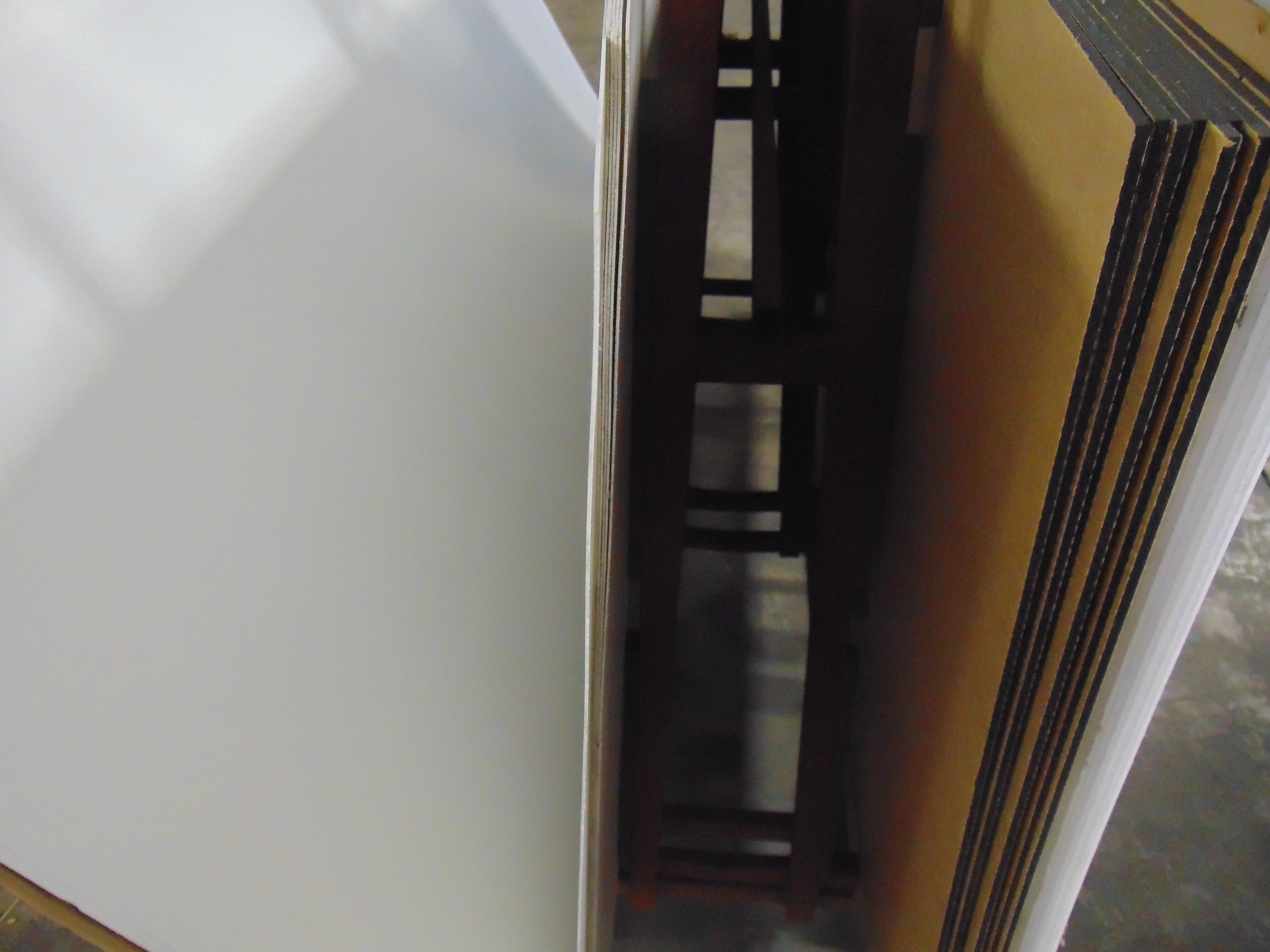 A sheet of white acrylic plexiglass
