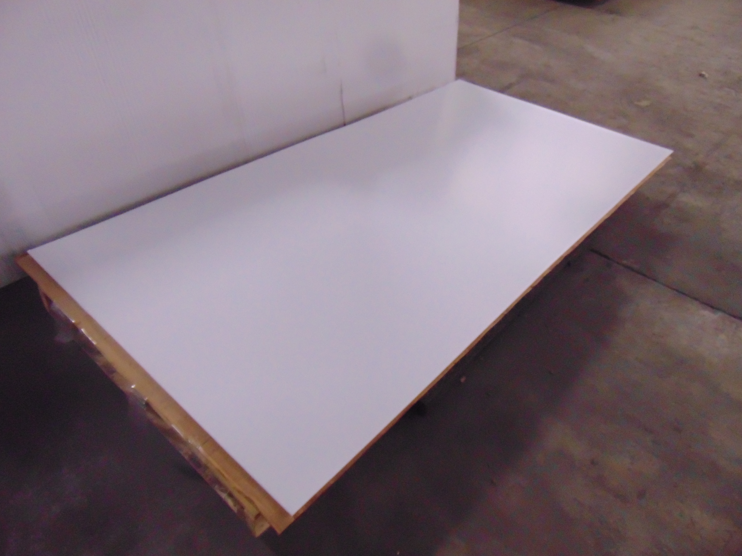 A sheet of white acrylic plexiglass