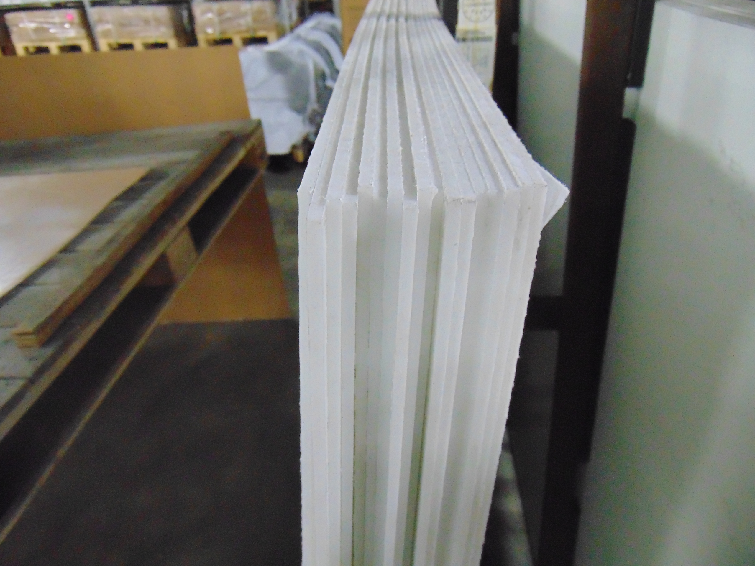 A sheet of white acrylic plexiglass