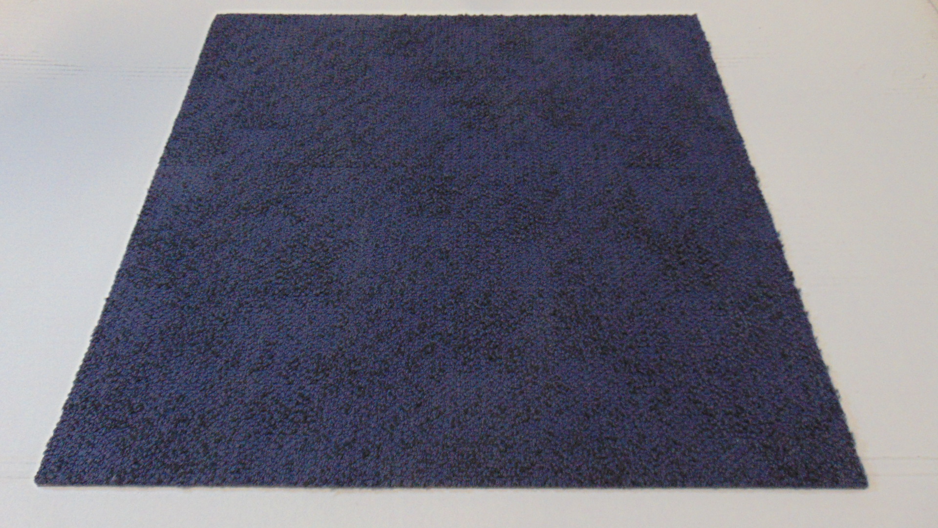 A blue carpet tile