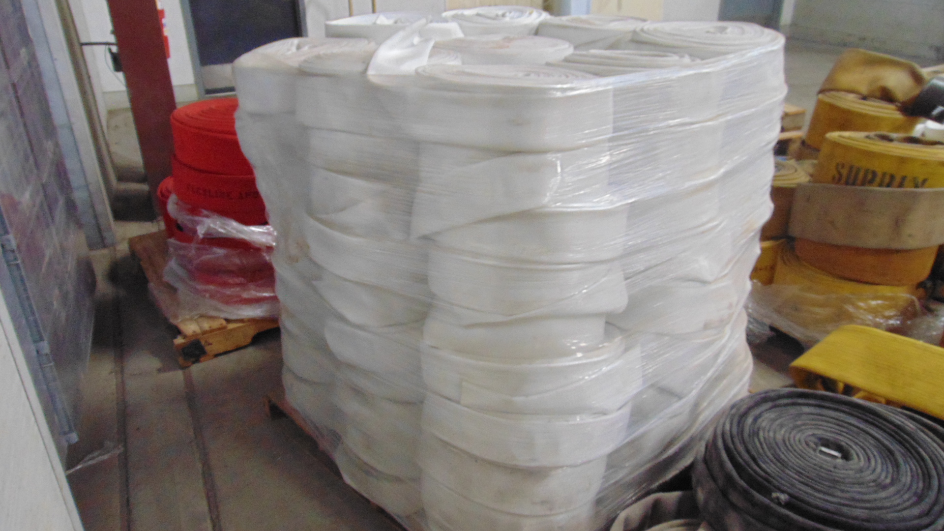 A white fire hose with no couplings