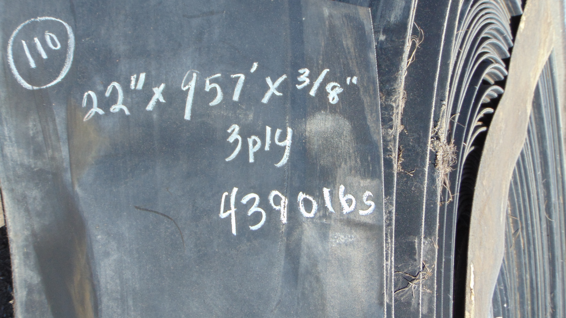 A roll of used rubber conveyor