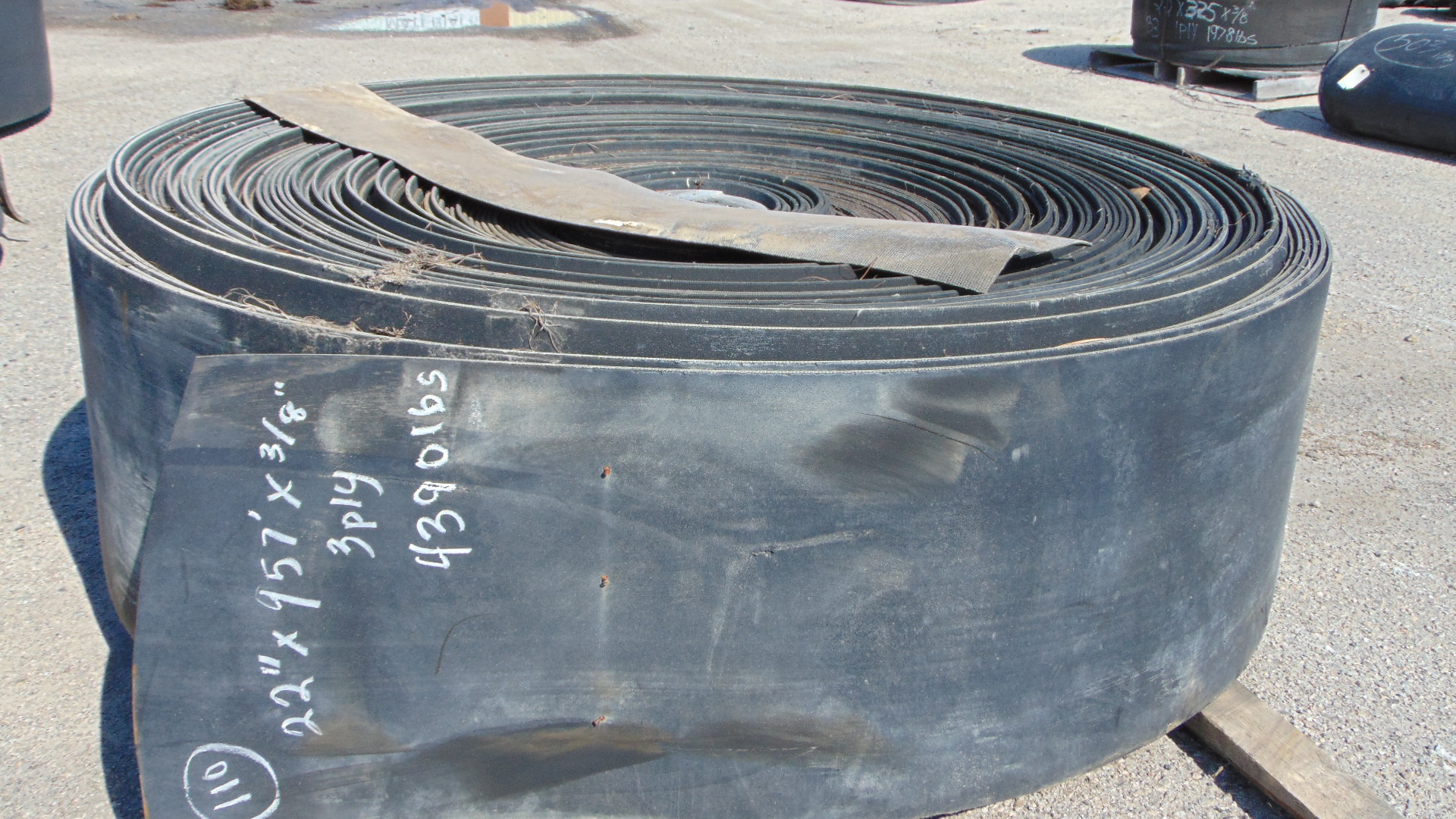 A roll of used rubber conveyor