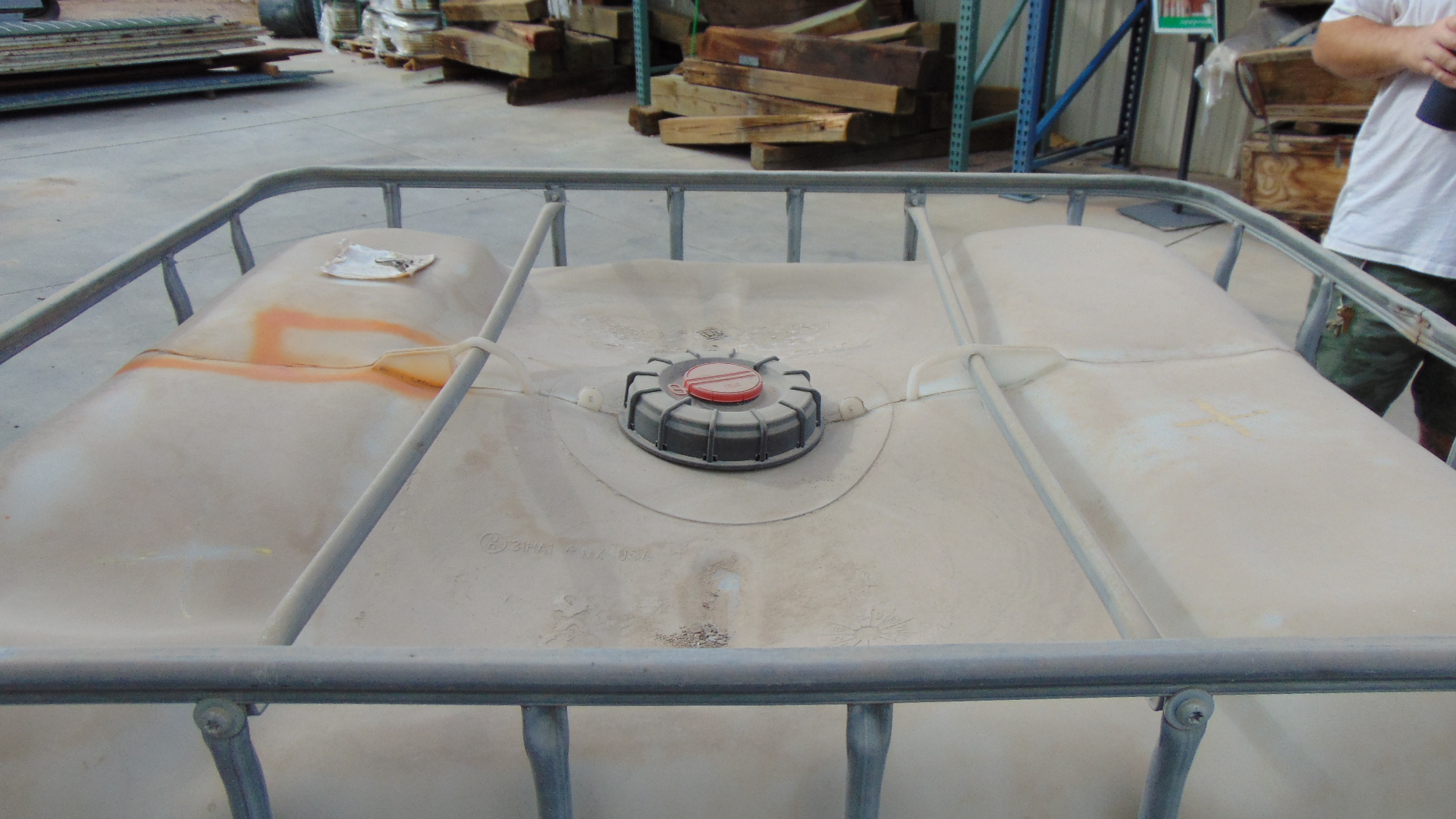 Container of Grind Aid