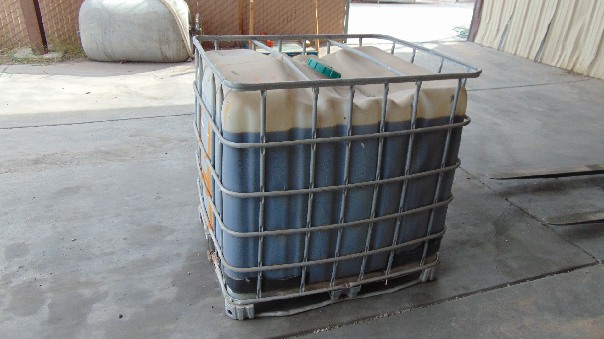 Container of Grind Aid