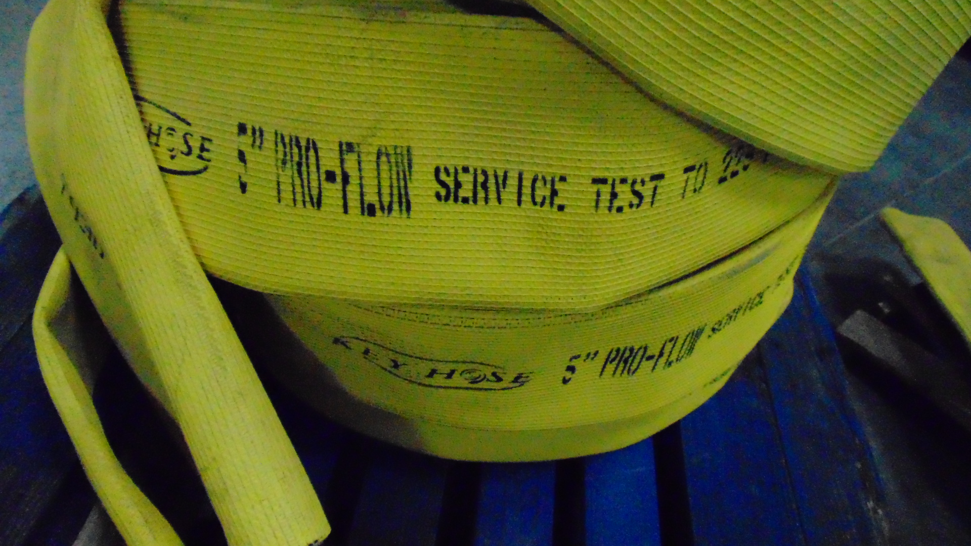 a yellow fire hose with no couplings
