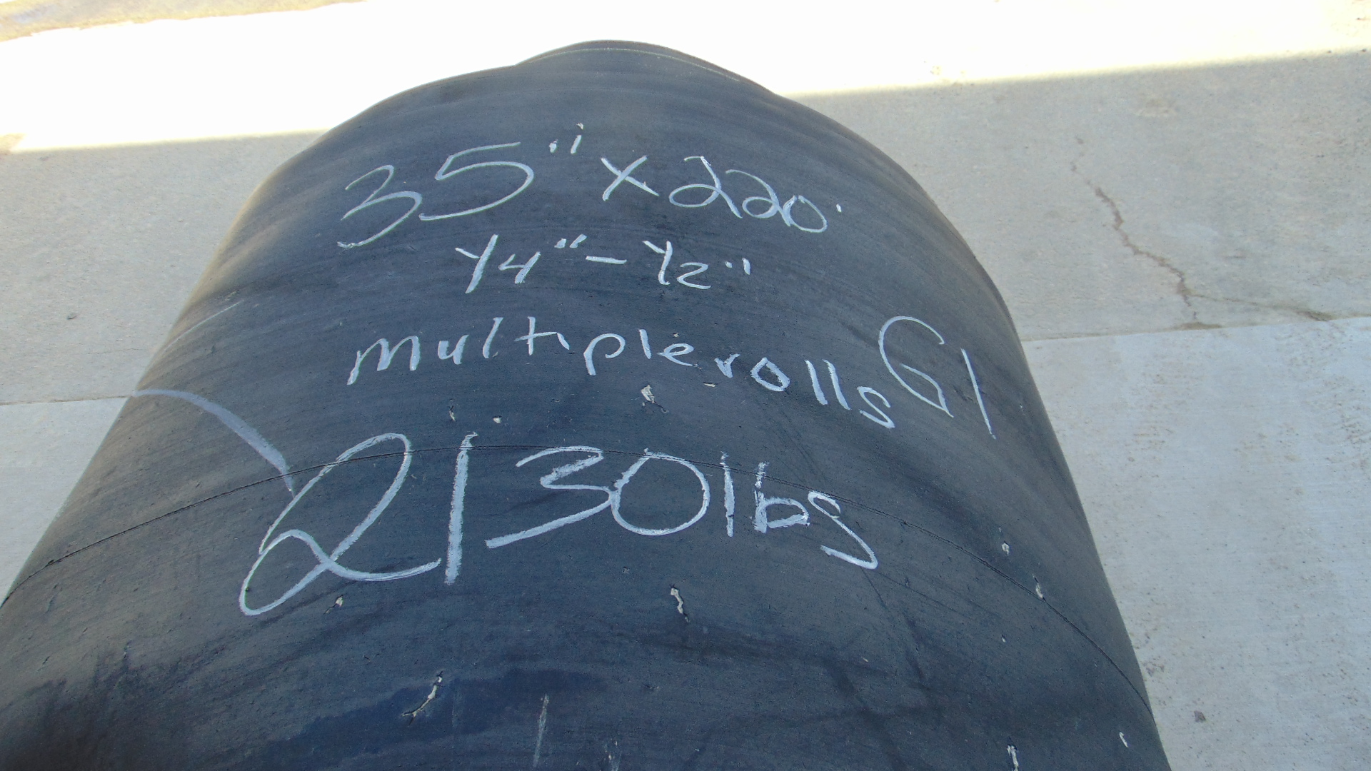 A roll of used rubber conveyor