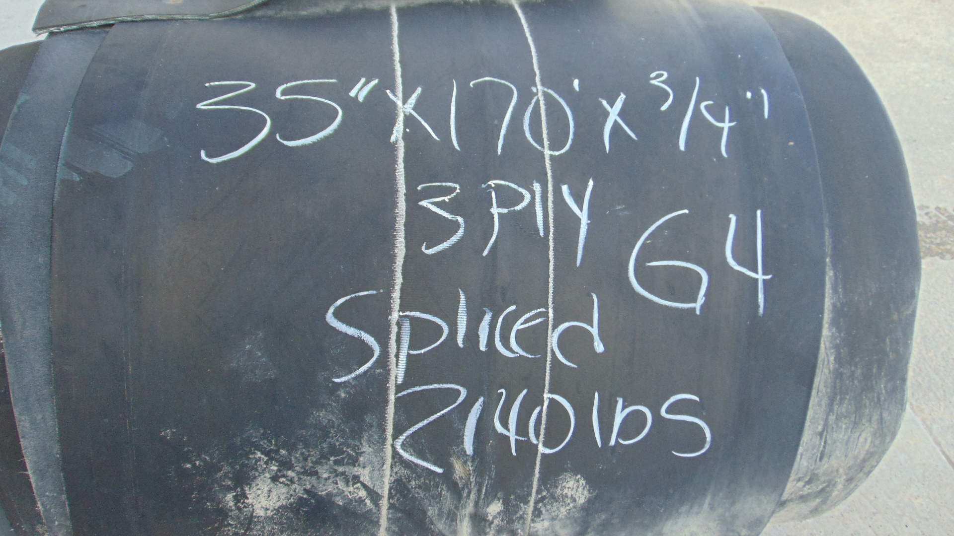 A roll of used rubber conveyor