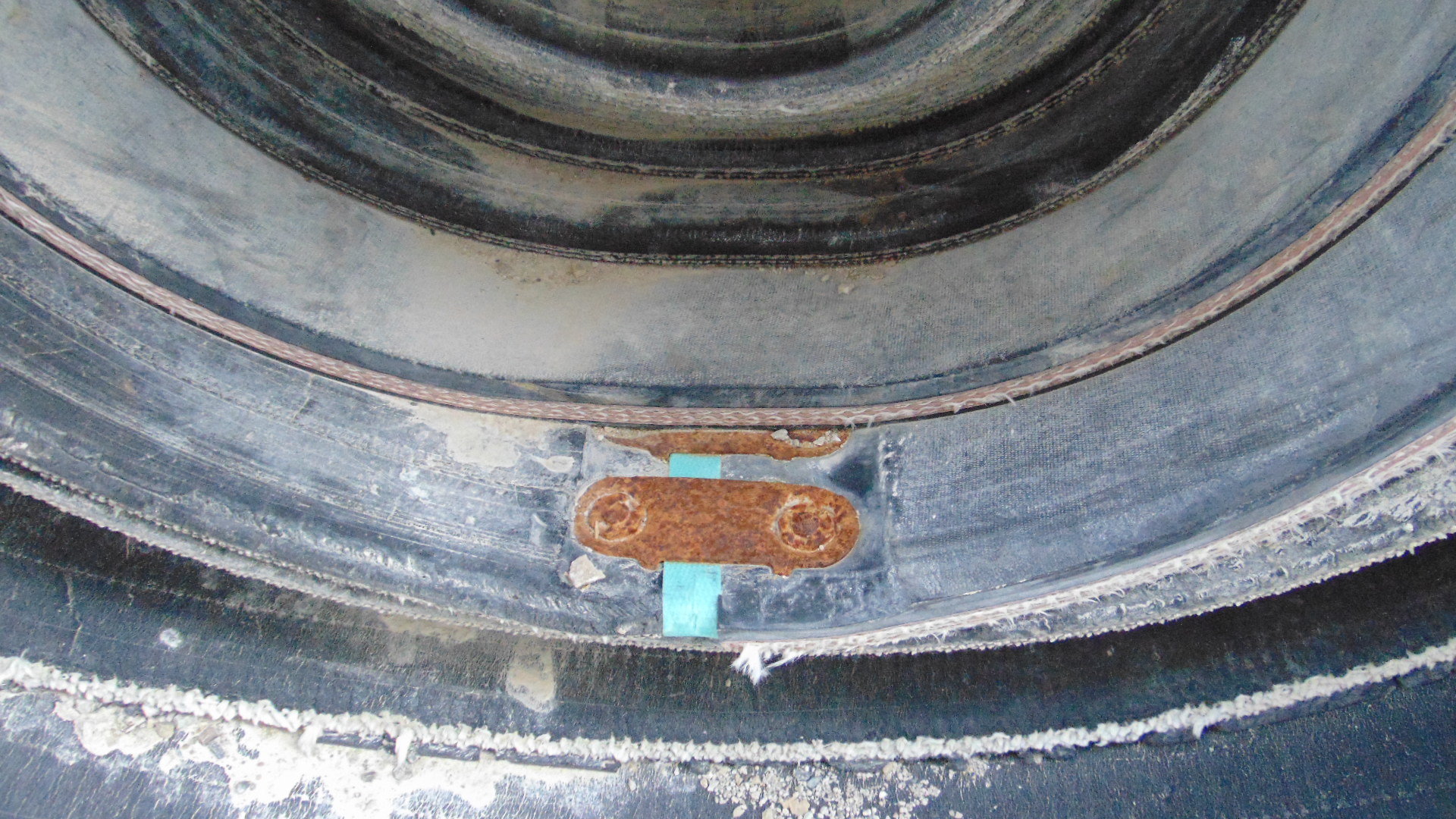 A roll of used rubber conveyor