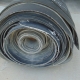 A roll of used rubber conveyor