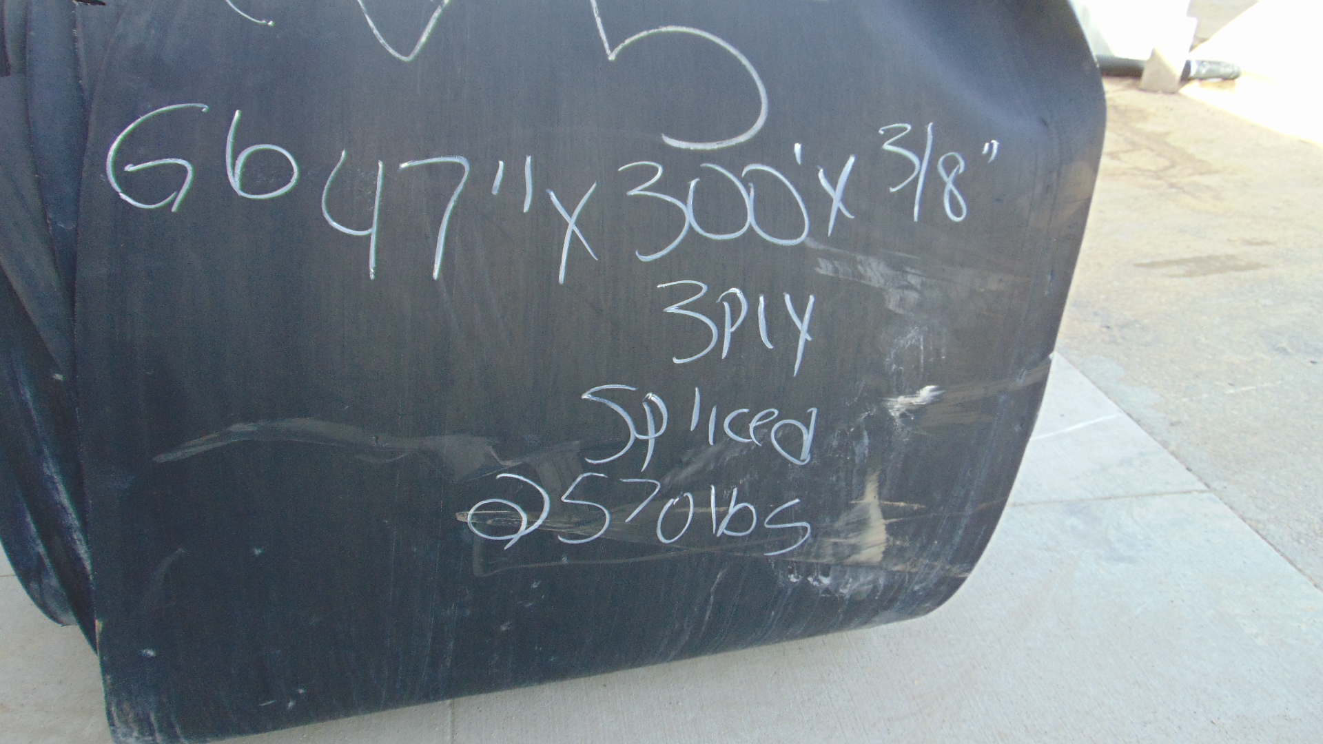 A roll of used rubber conveyor