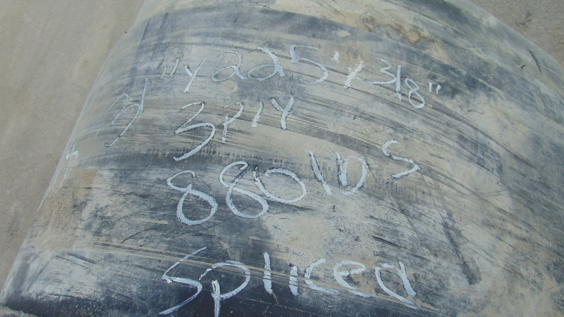 A roll of used rubber conveyor