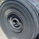 A roll of used rubber conveyor