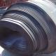 A roll of used rubber conveyor