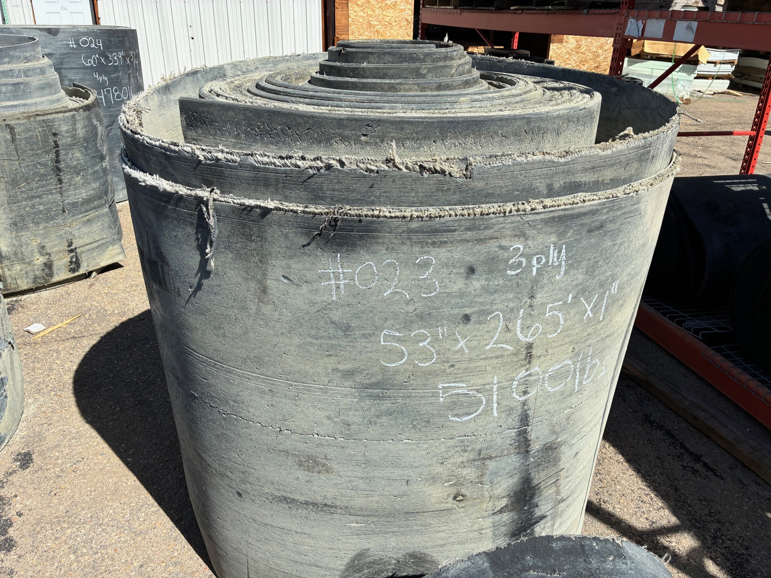 A roll of used rubber conveyor