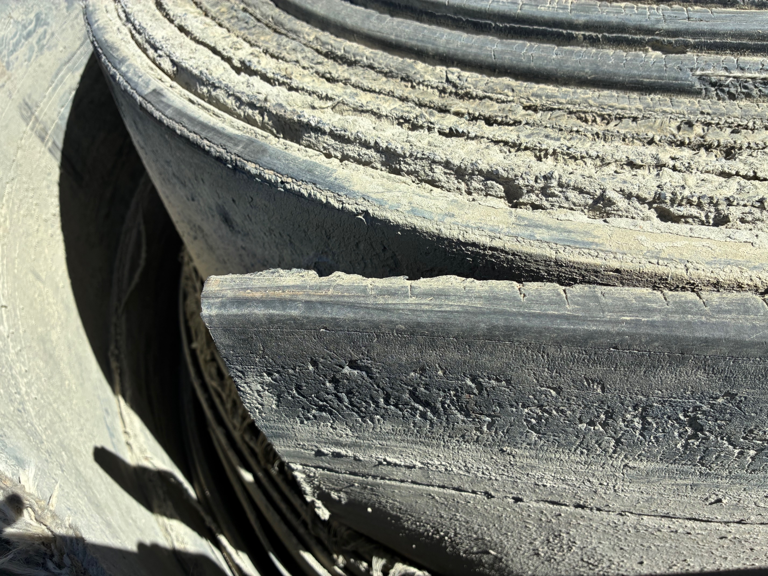 A roll of used rubber conveyor