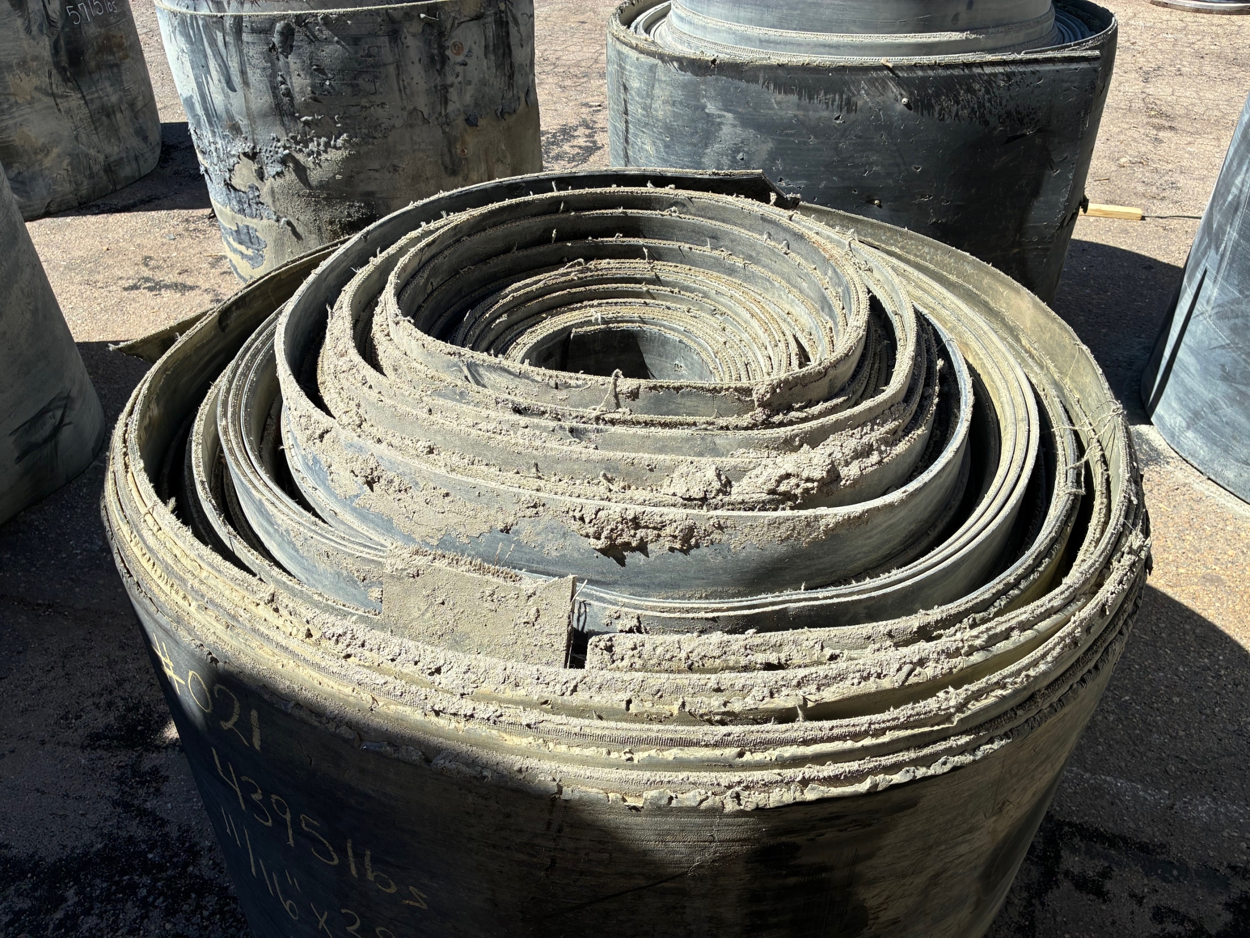 A roll of used rubber conveyor