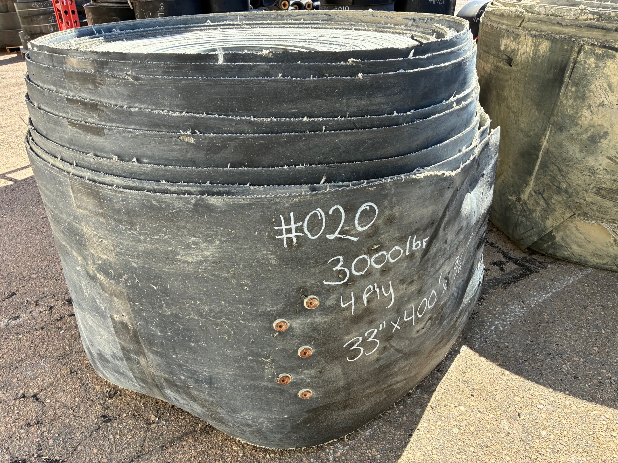 A roll of used rubber conveyor