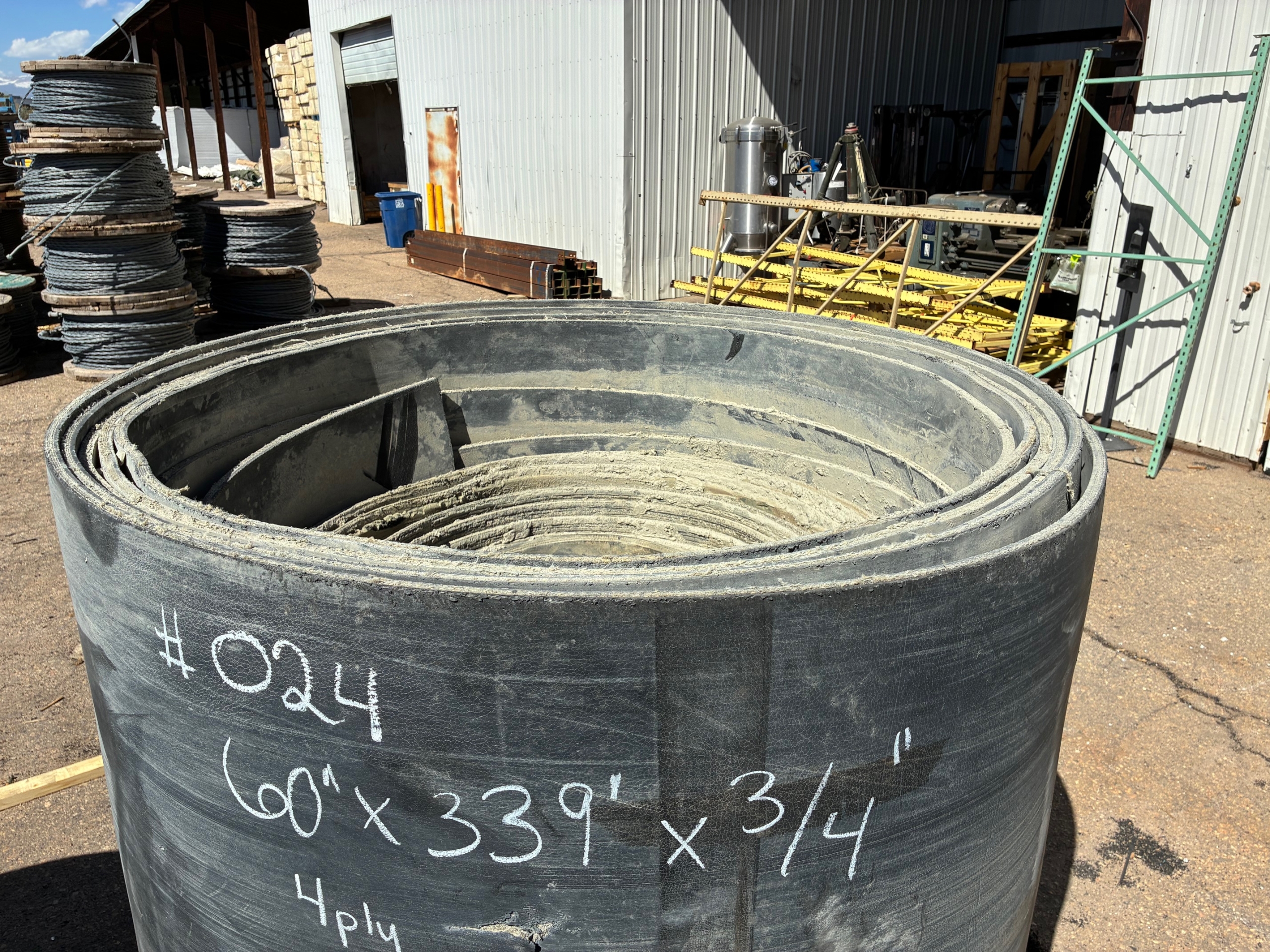 A roll of used rubber conveyor