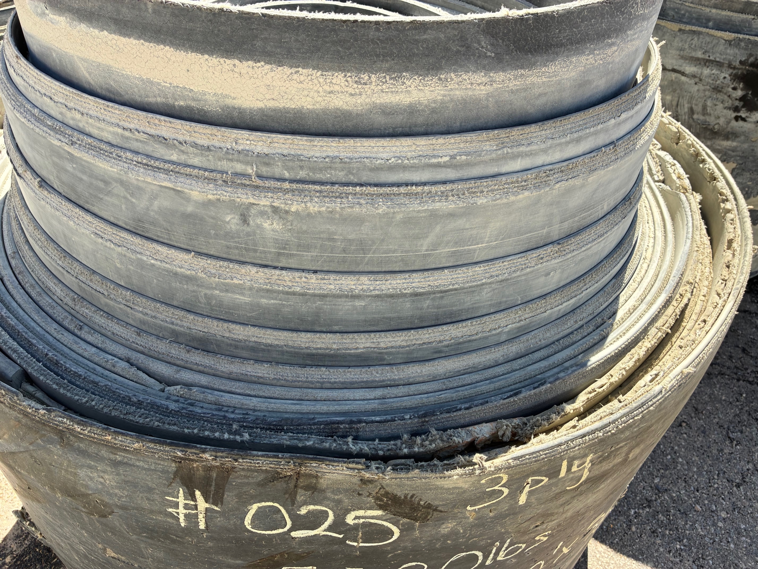 A roll of used rubber conveyor