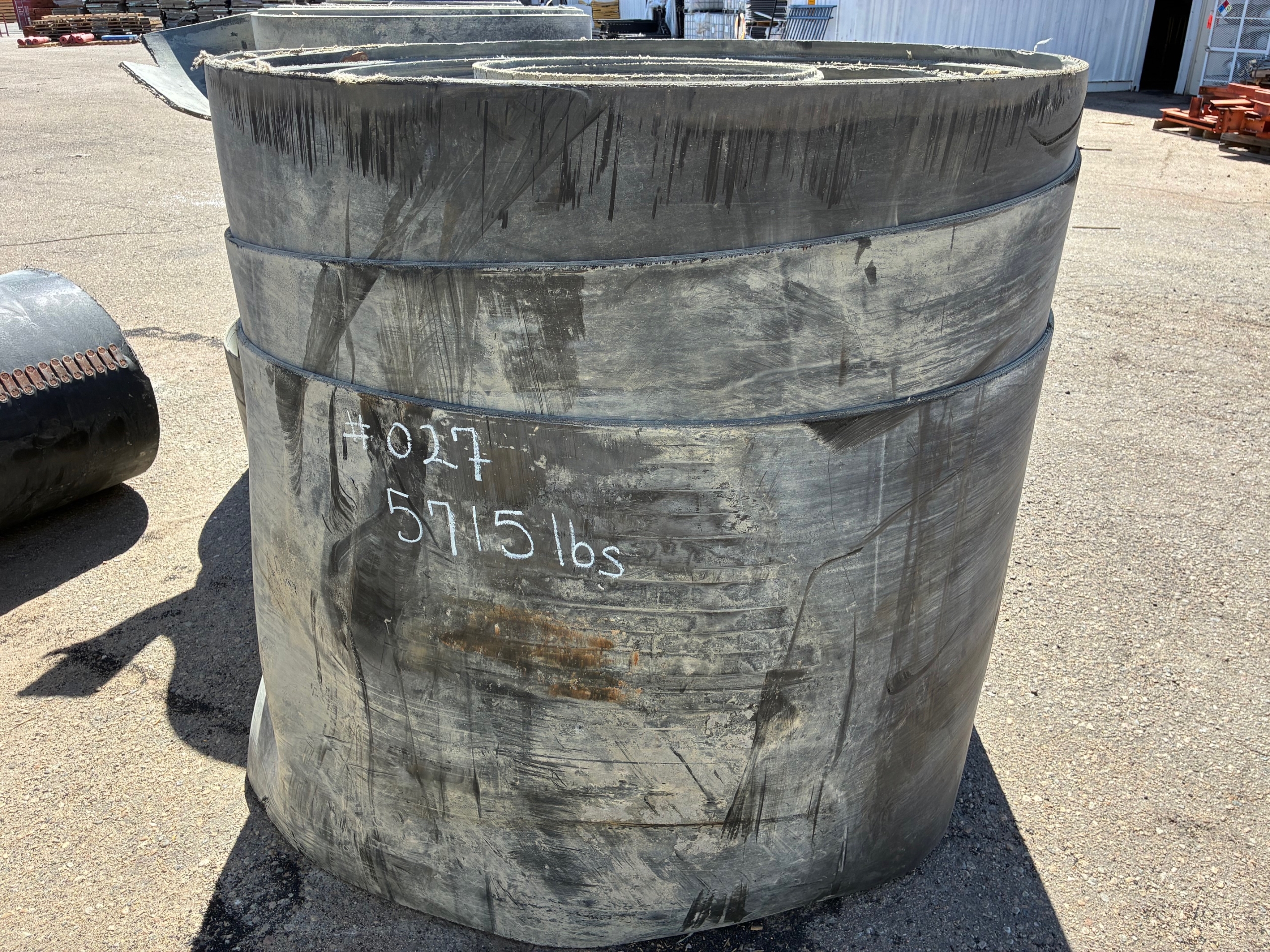 A roll of used rubber conveyor