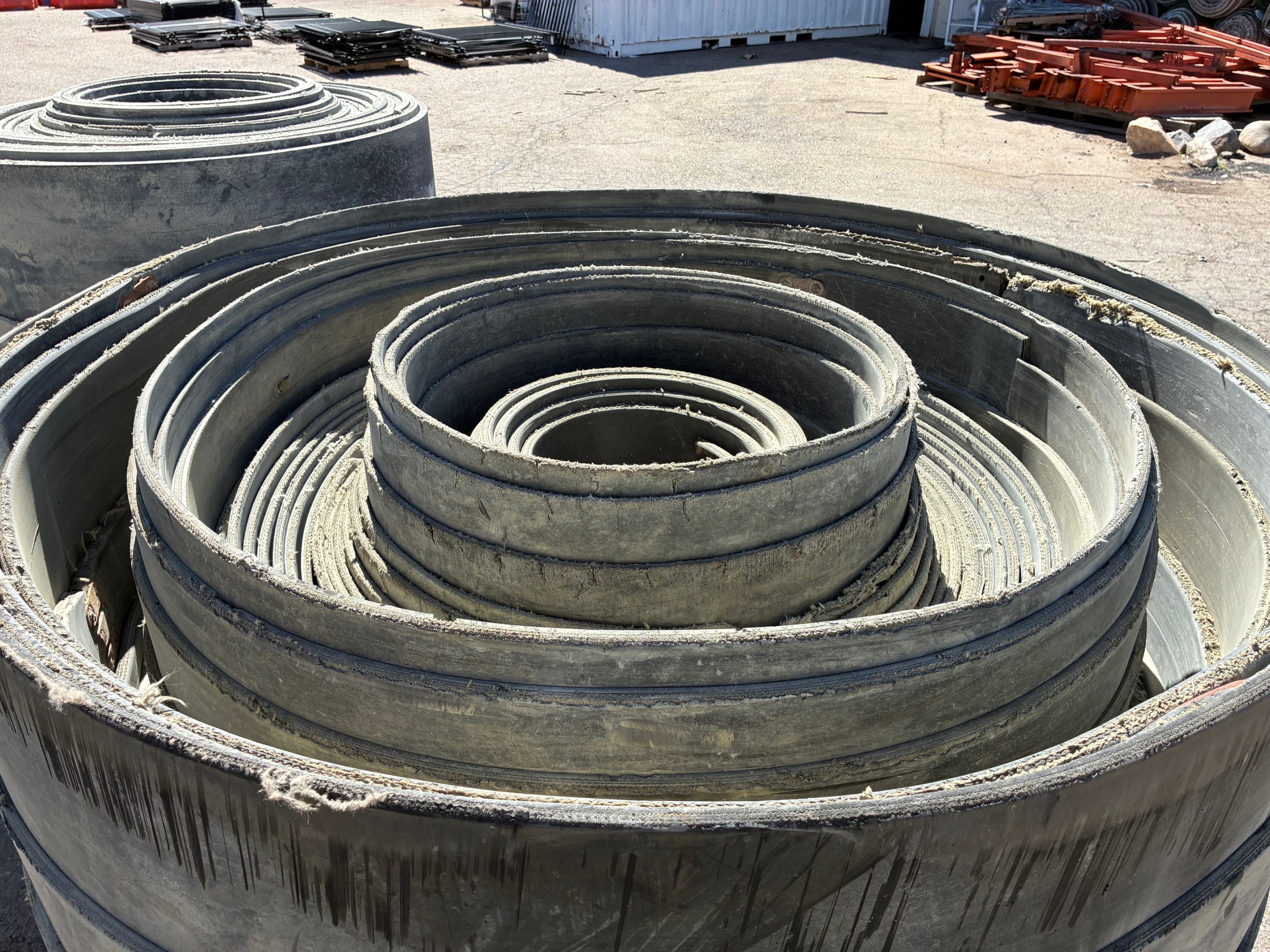 A roll of used rubber conveyor