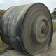 A roll of used rubber conveyor