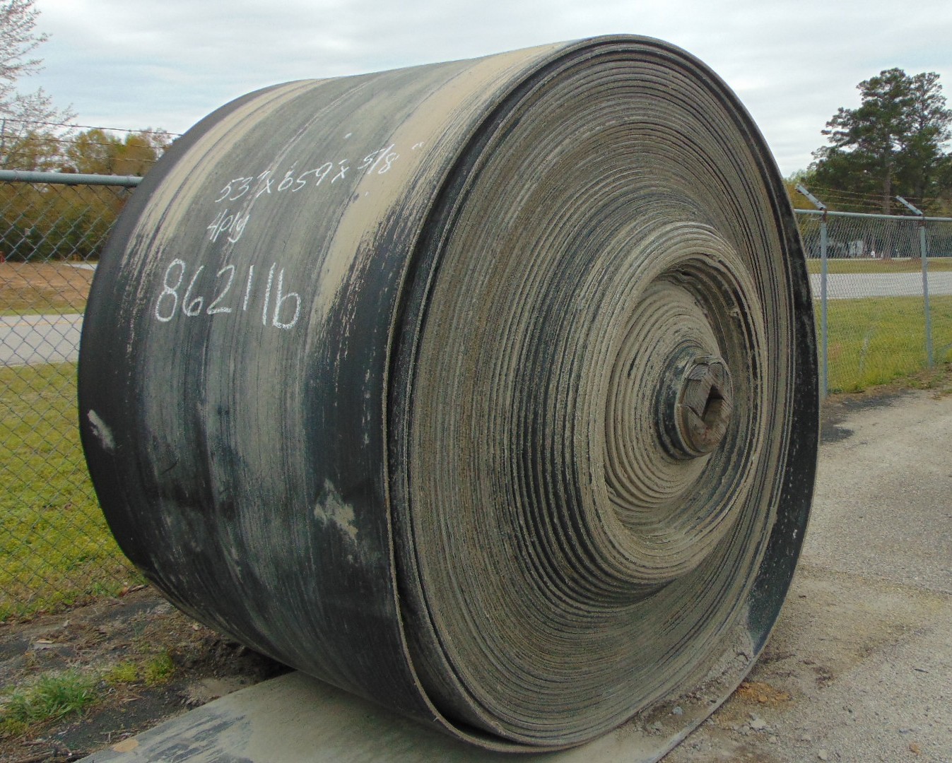 A roll of used rubber conveyor