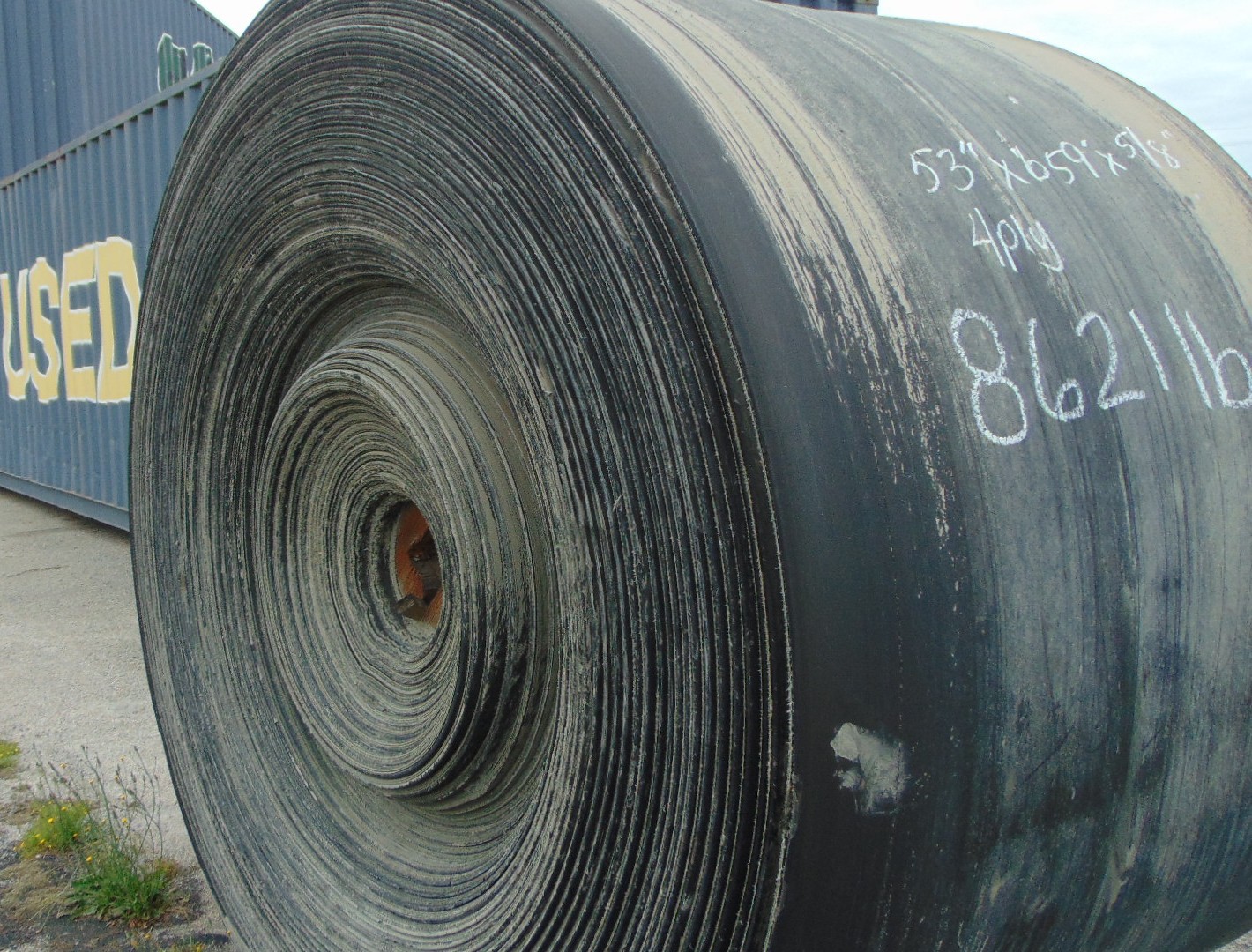 A roll of used rubber conveyor