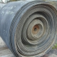 A roll of used rubber conveyor