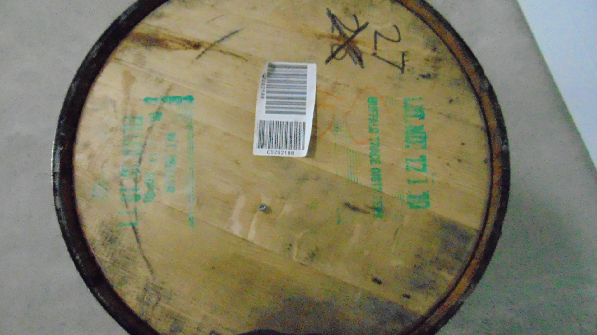 A used wooden whiskey barrel