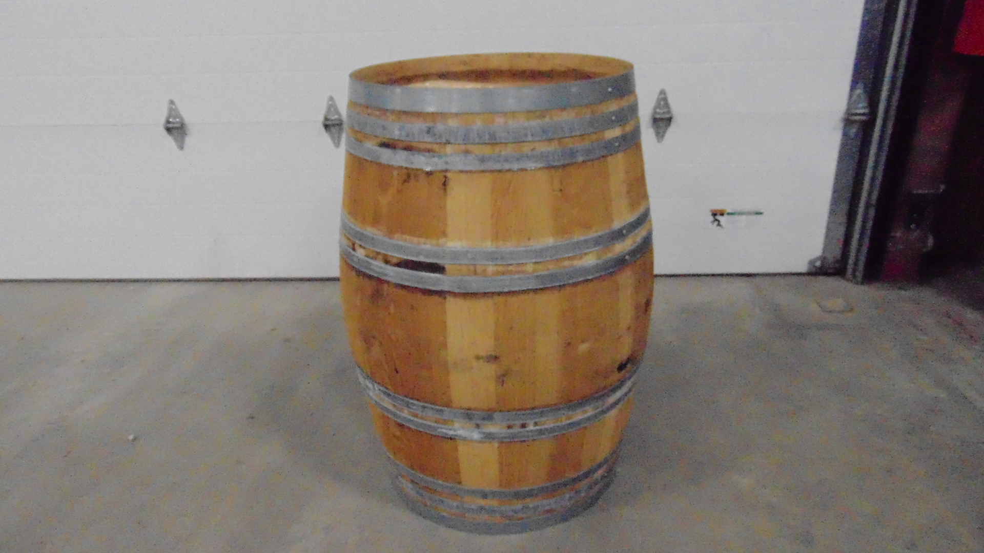 A used wooden whiskey barrel