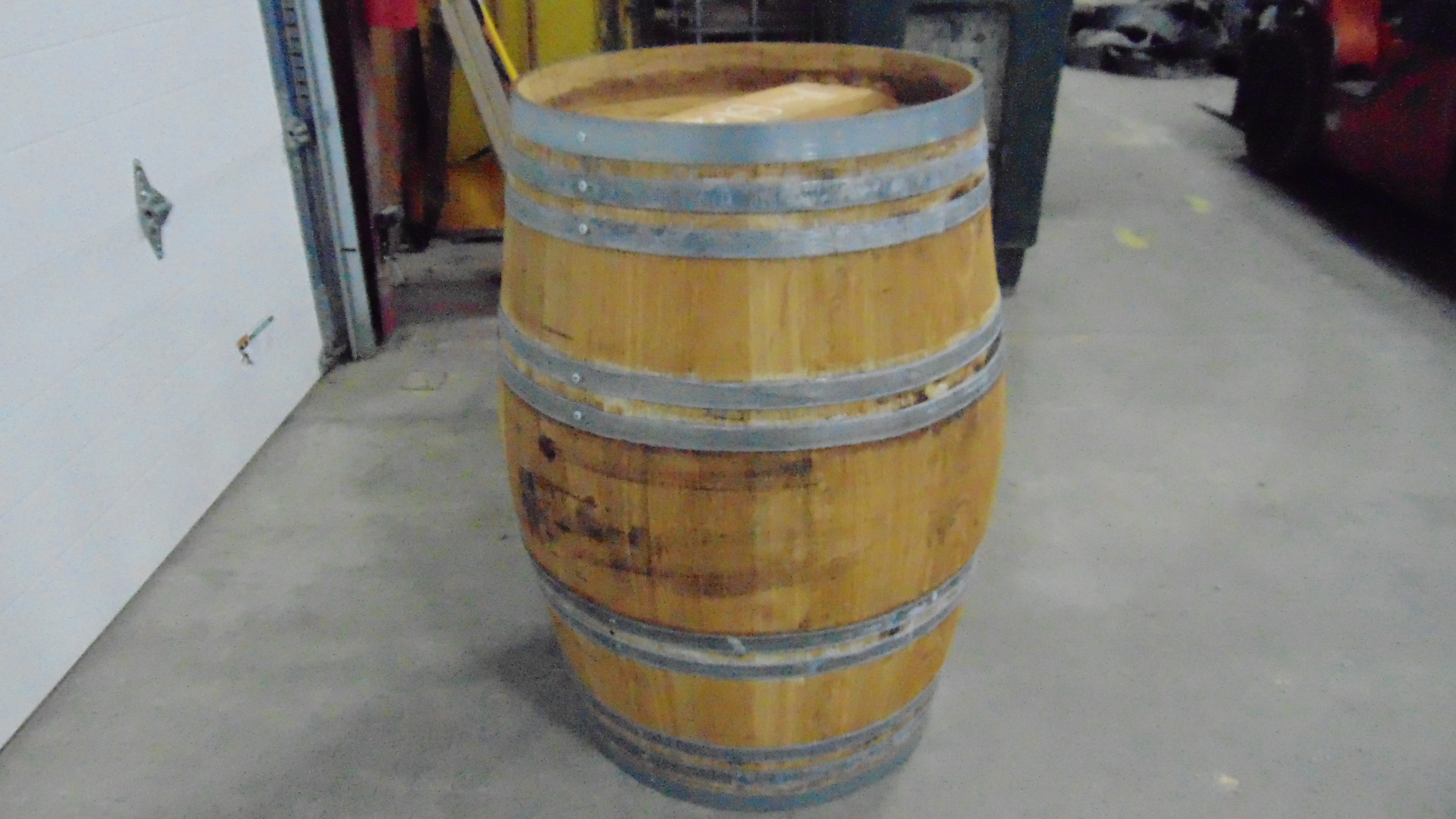 A used wooden whiskey barrel