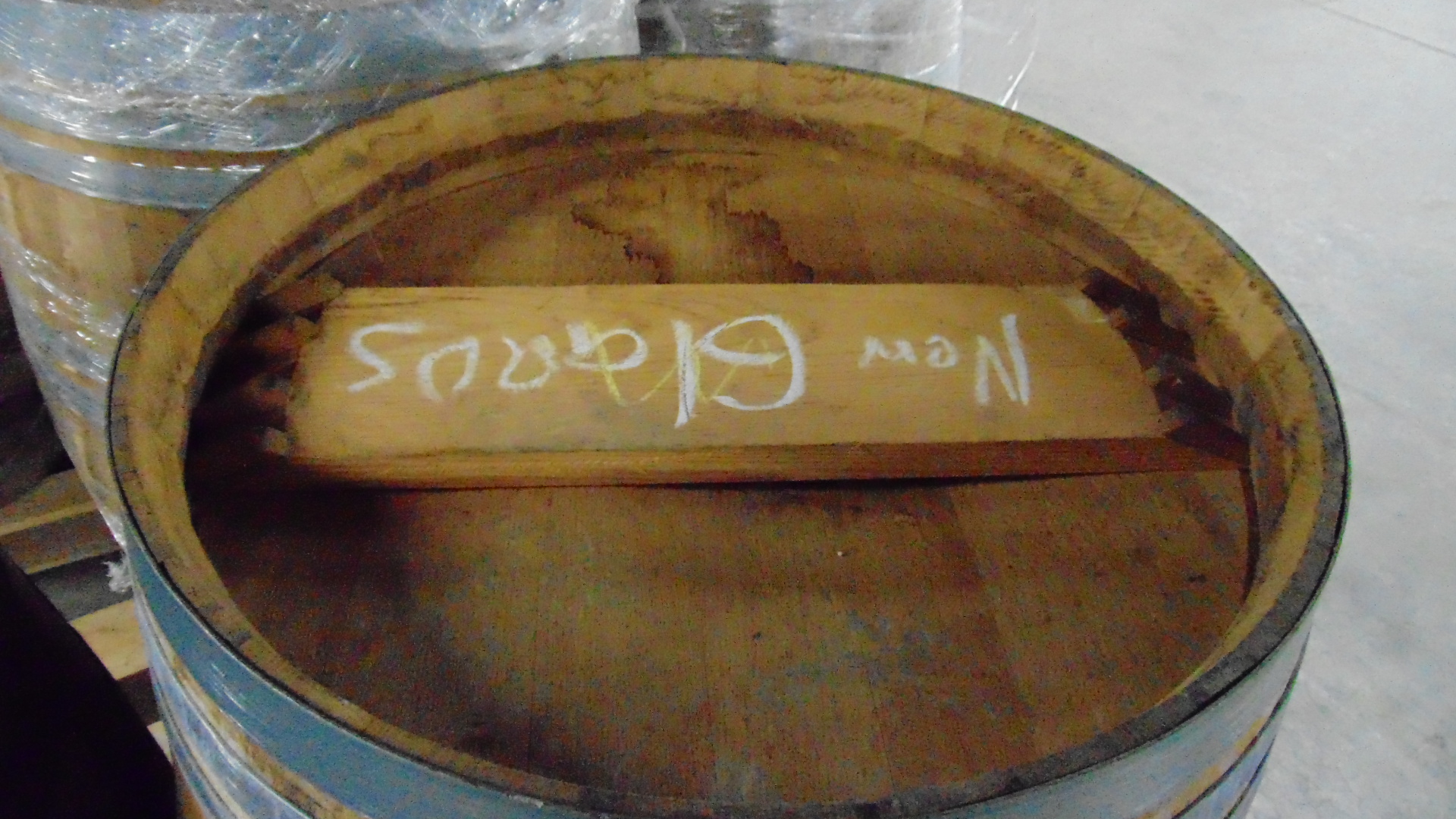 A used wooden whiskey barrel