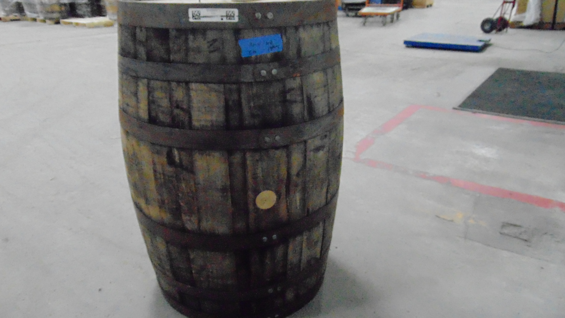 A used wooden whiskey barrel