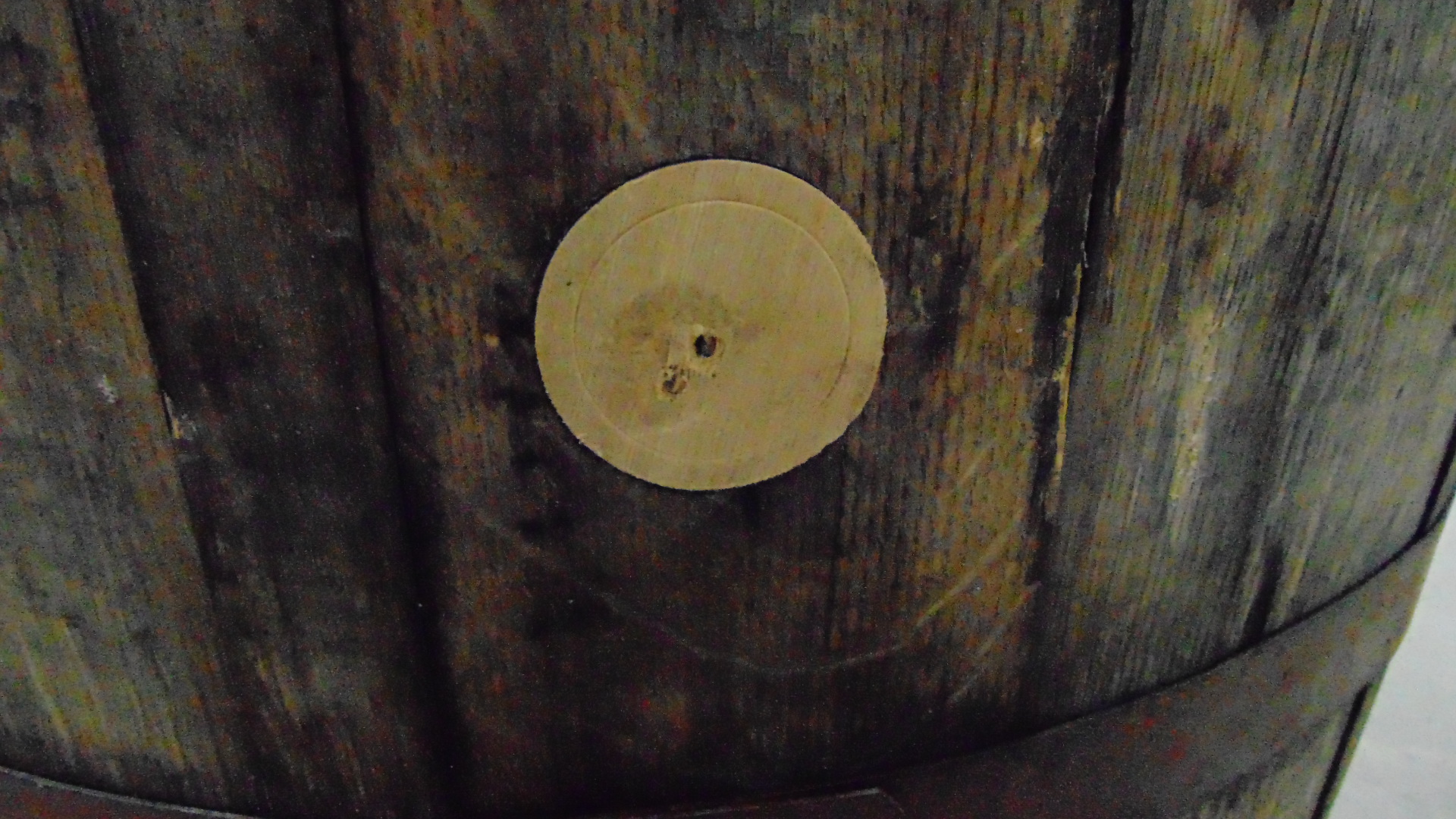A used wooden whiskey barrel