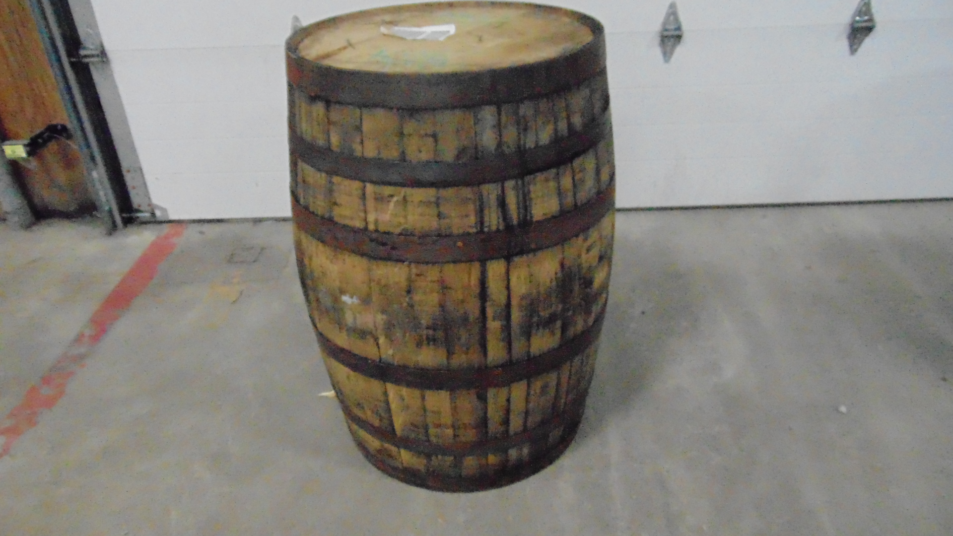 A used wooden whiskey barrel