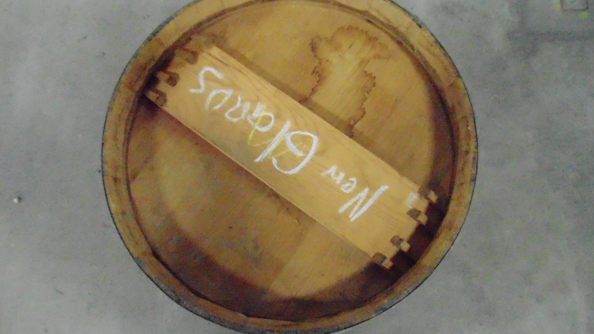 A used wooden whiskey barrel